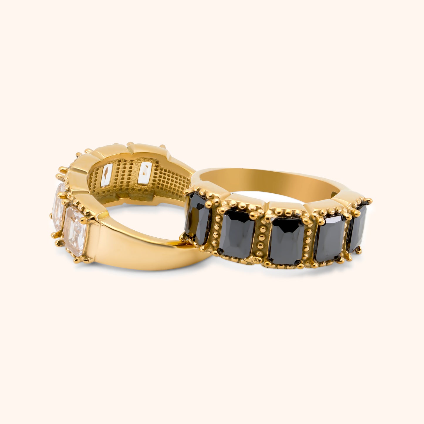 Gold statement ring with rectangular black gemstones and beaded prong settings, made of 18k gold plated stainless steel