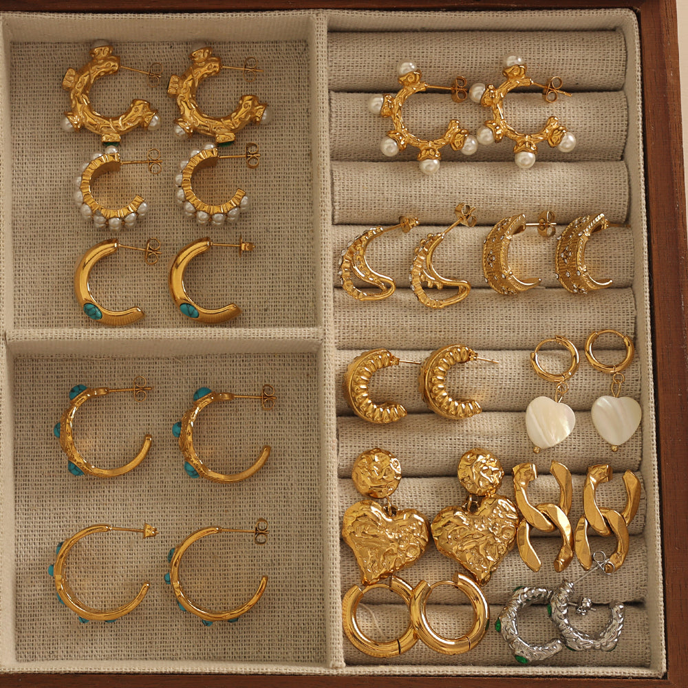 Pressie Crystal Boho Gold Hoop Earrings, 18K gold plated stainless steel with a collection of other earrings.