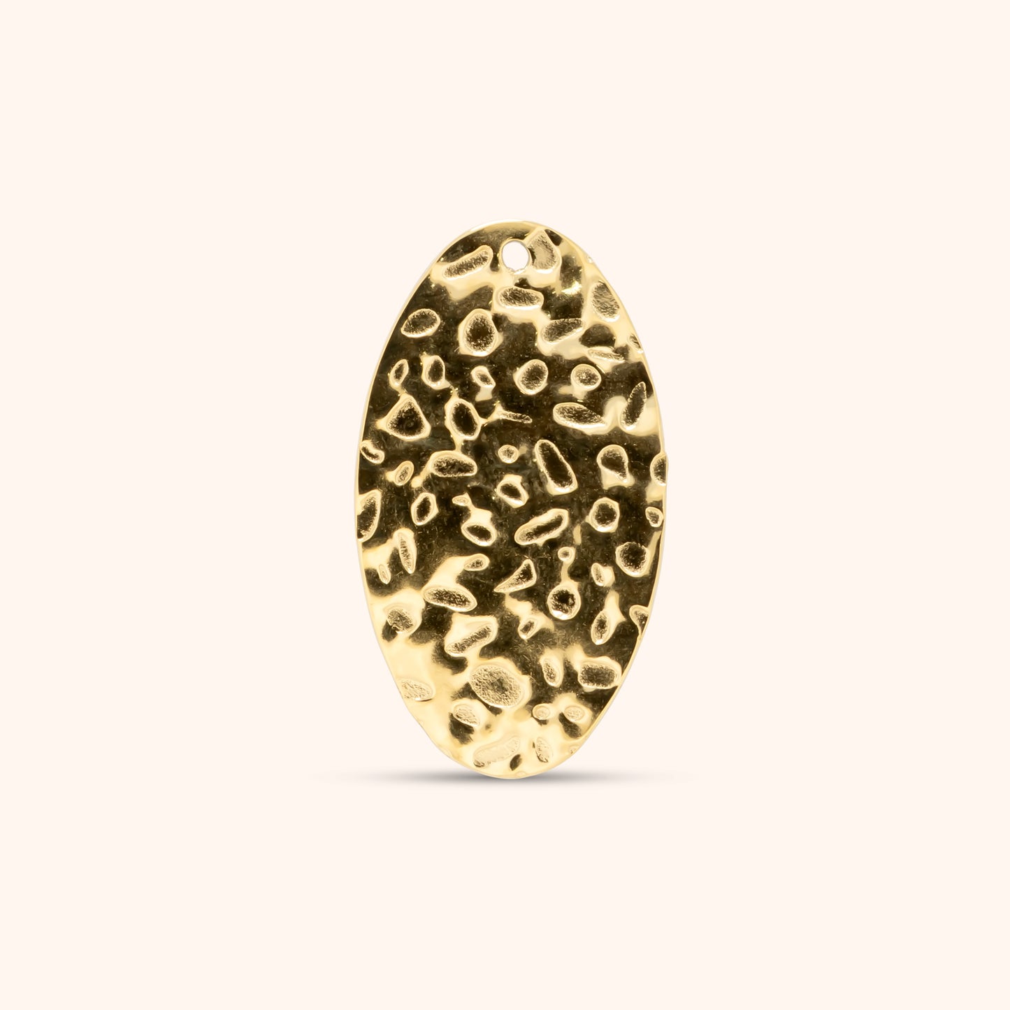 PRESSIE Ripple Charm; an 18k gold plated elongated oval charm with a distinctive hammered texture and a top hole for attachment.