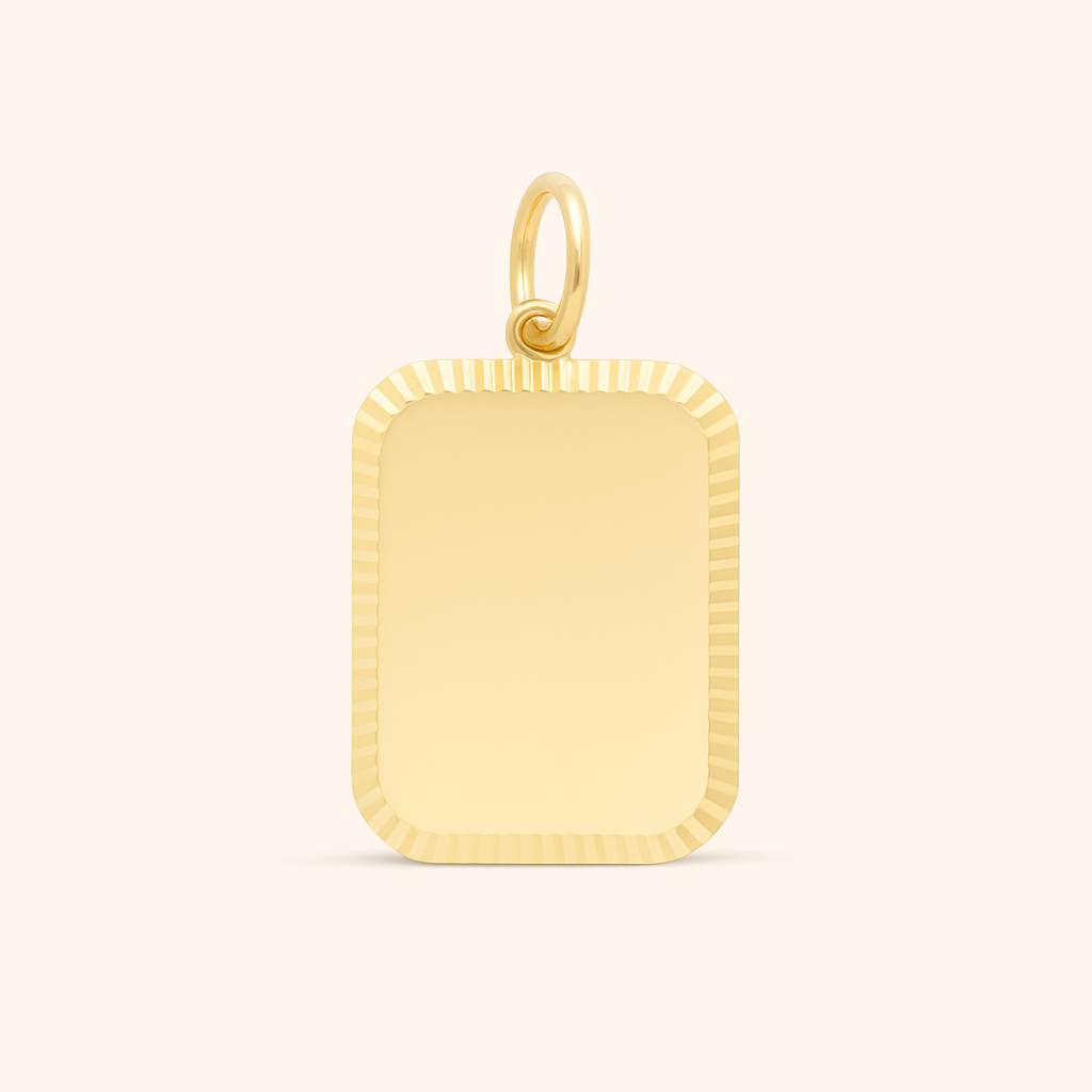Rectangular gold charm with rounded corners and ribbed edge detailing, made of 18k gold plated stainless steel with polished finish