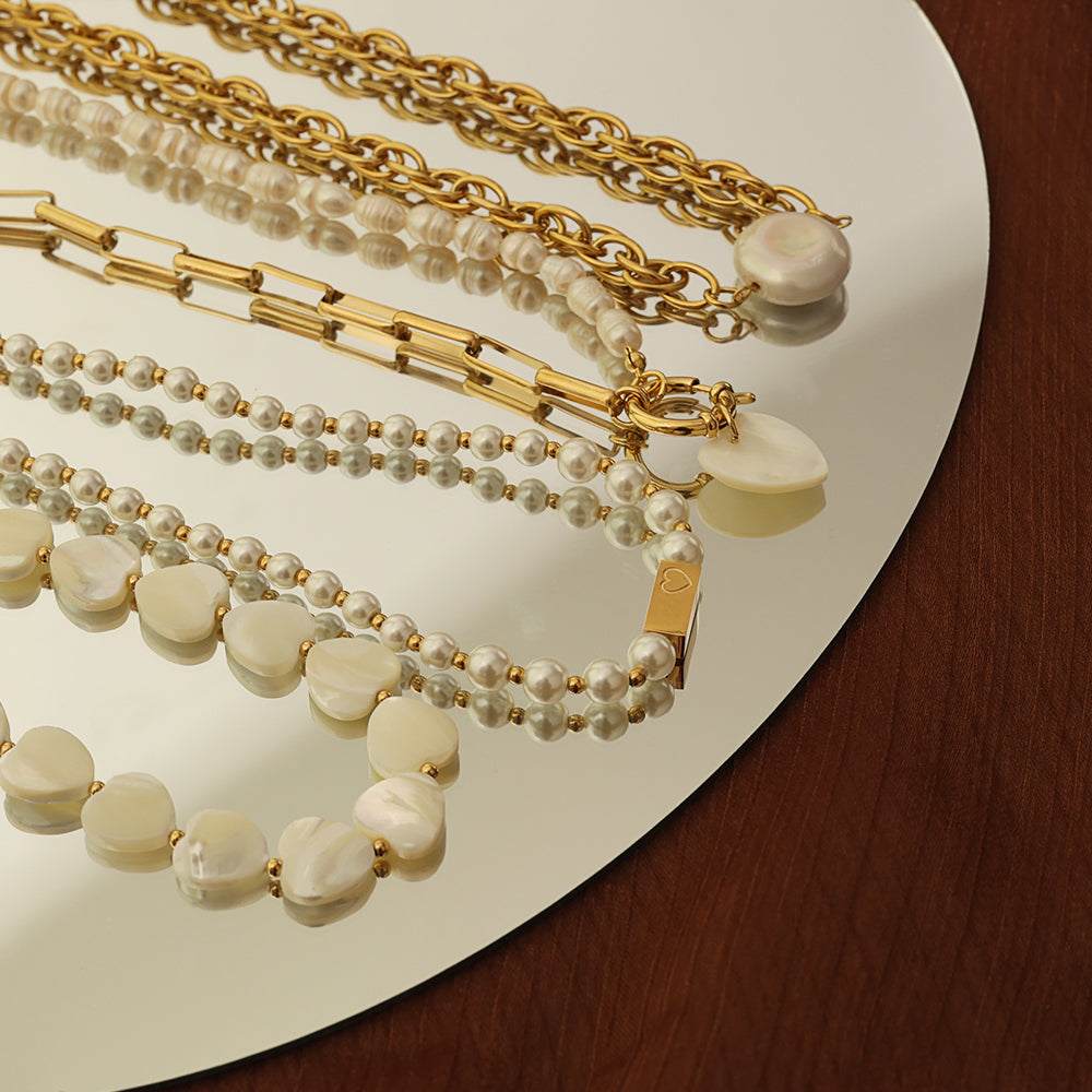 Pressie Baroque Pearl Necklace with other gold plated necklaces