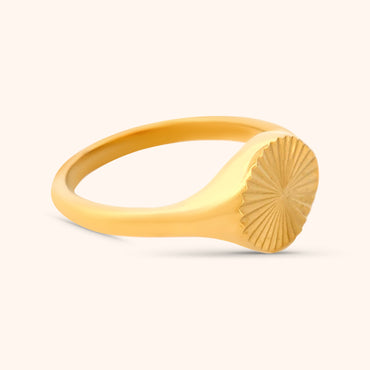 Side view of the Helios Ring, showcasing the thickness of the band and the raised circular sun design.