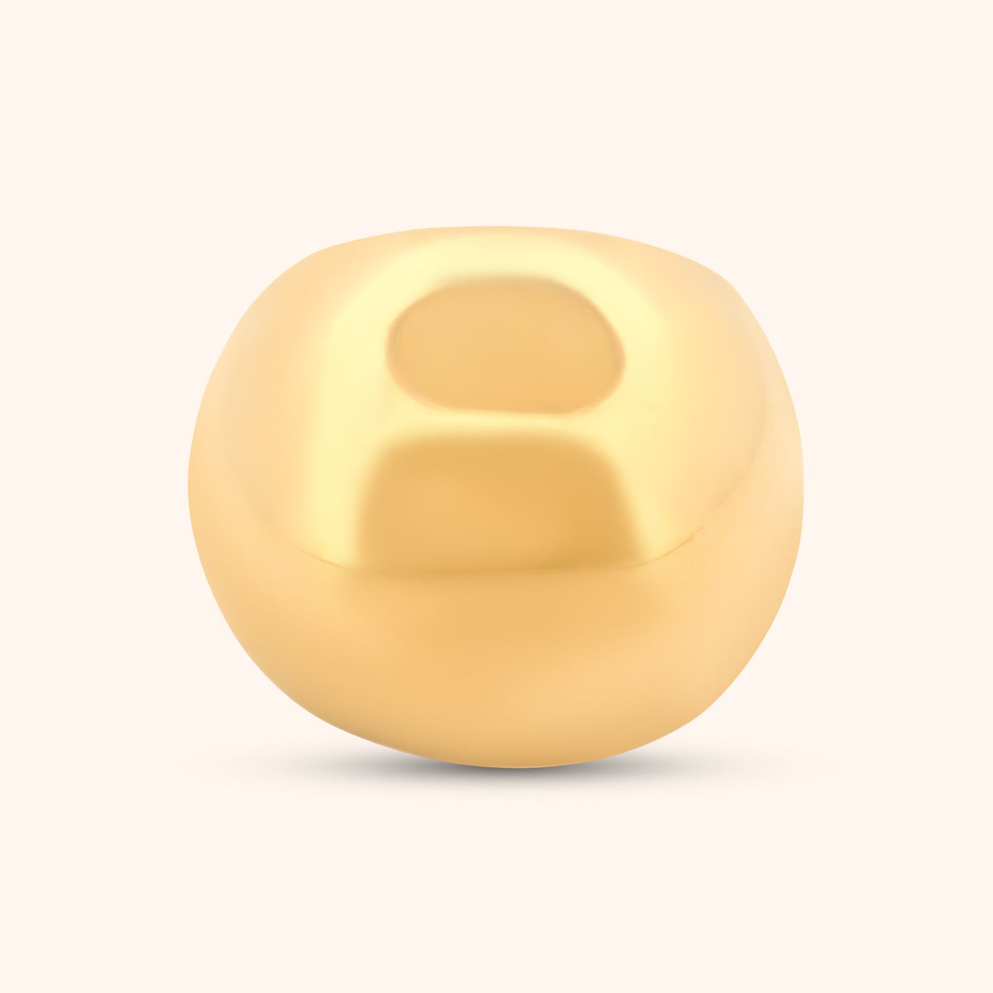 Close-up of The Dubai Ring, showcasing its smooth, circular dome design and polished gold band against a clean white background.
