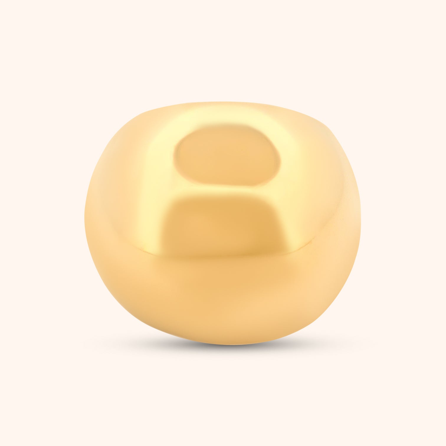 Close-up of The Dubai Ring, showcasing its smooth, circular dome design and polished gold band against a clean white background.
