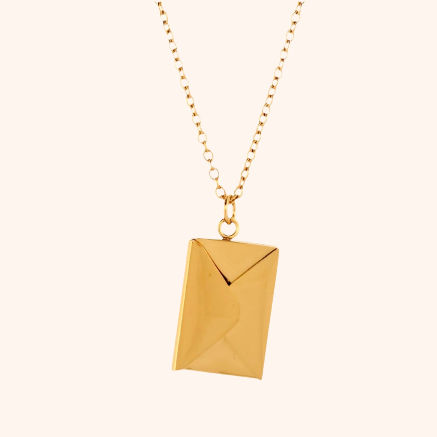 Gold functional envelope necklace on a white background, emphasizing its minimalist and modern design.
