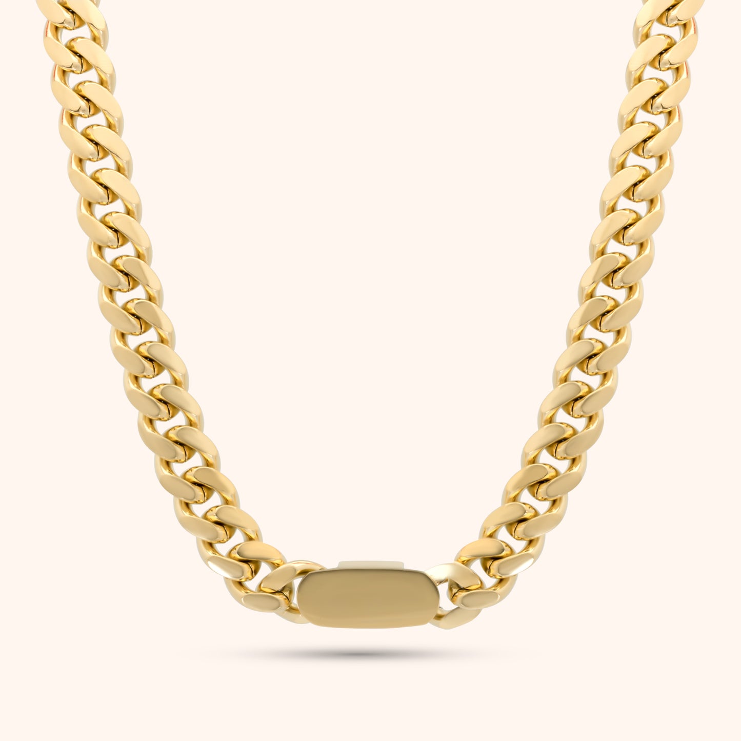 PRESSIE Iconic Link Necklace; an 18k gold plated substantial Cuban link chain with a sleek rectangular box clasp.