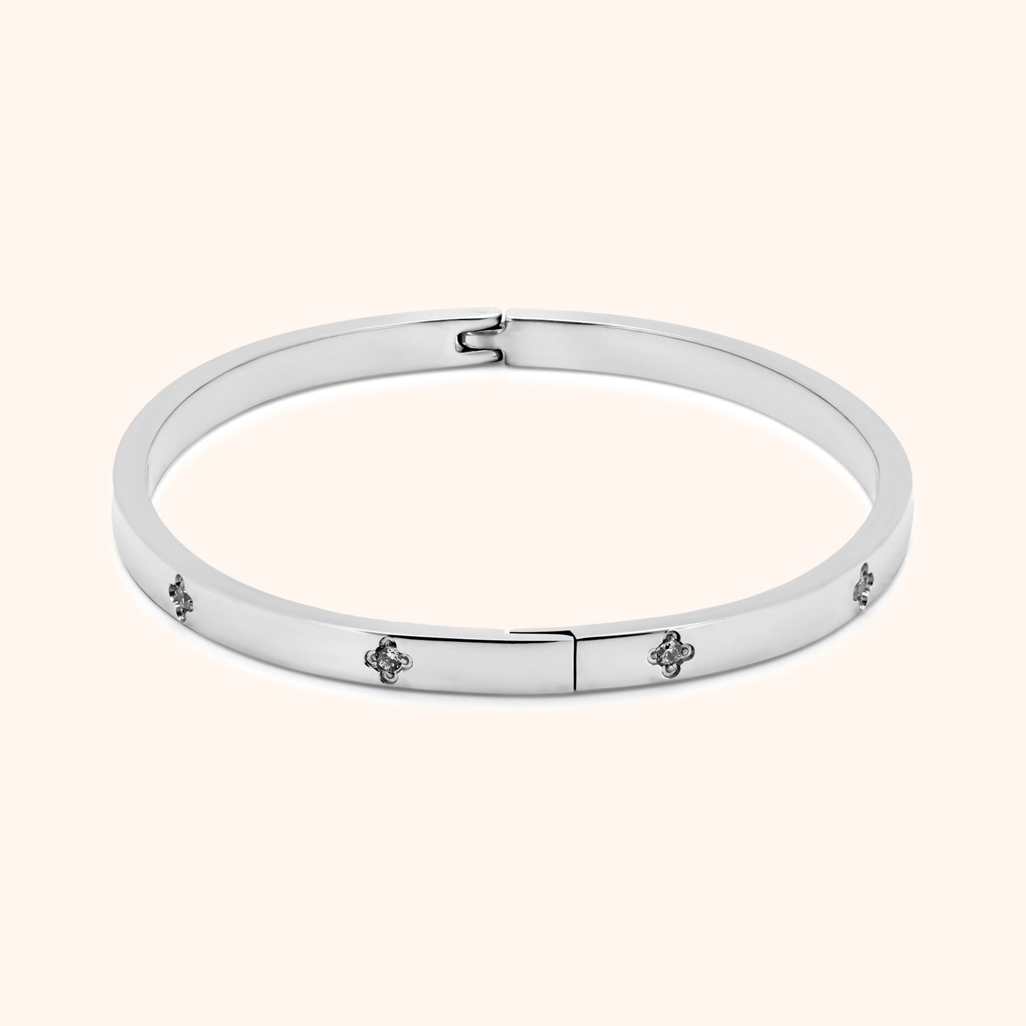 Silver clover bangle bracelet with side hinge and crystal details