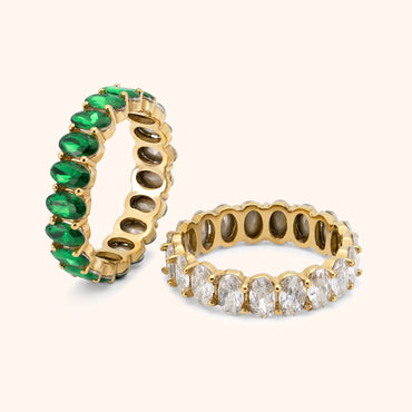 Gold eternity ring with oval-cut clear stones in full circle setting, made of 18k gold plated stainless steel