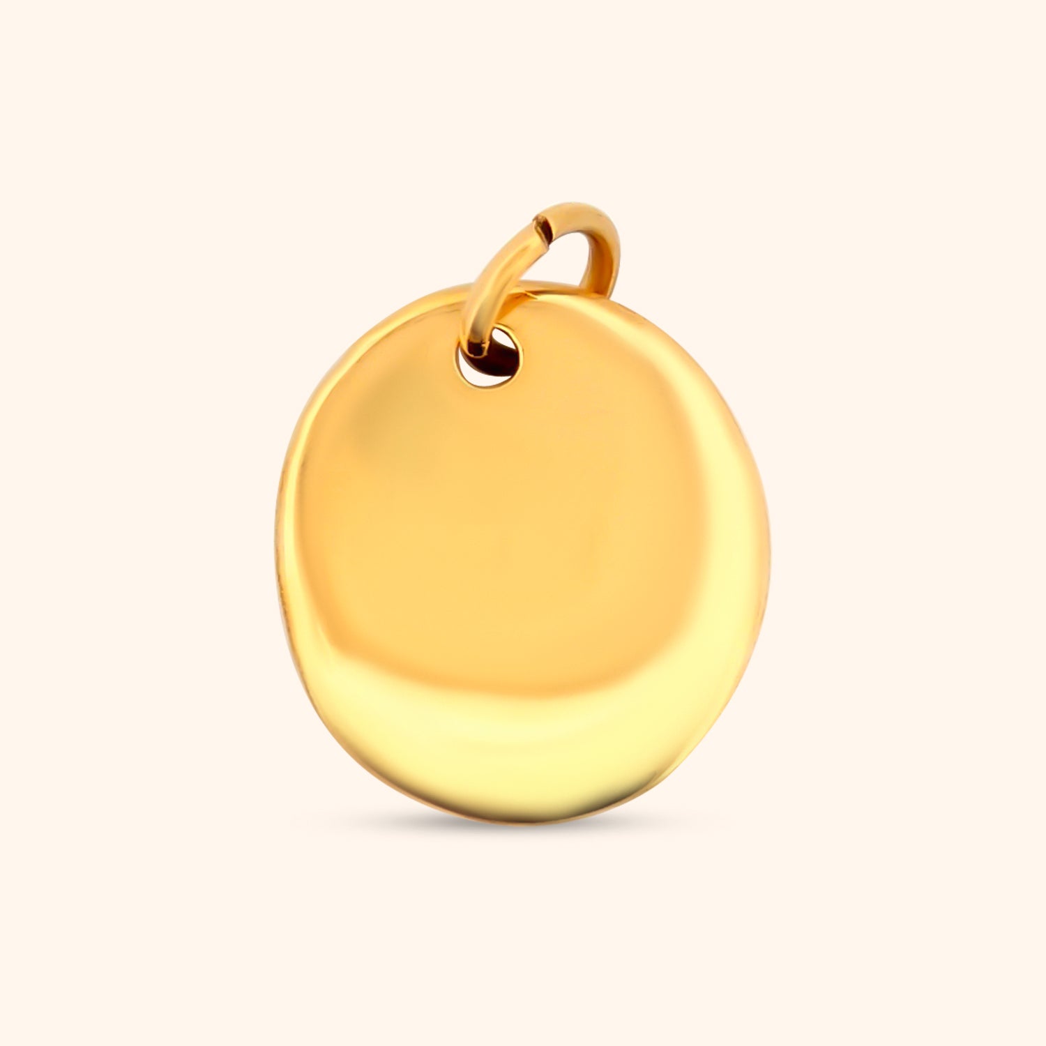 Close-up of the rear of the Solara Charm, showing the smooth texture.