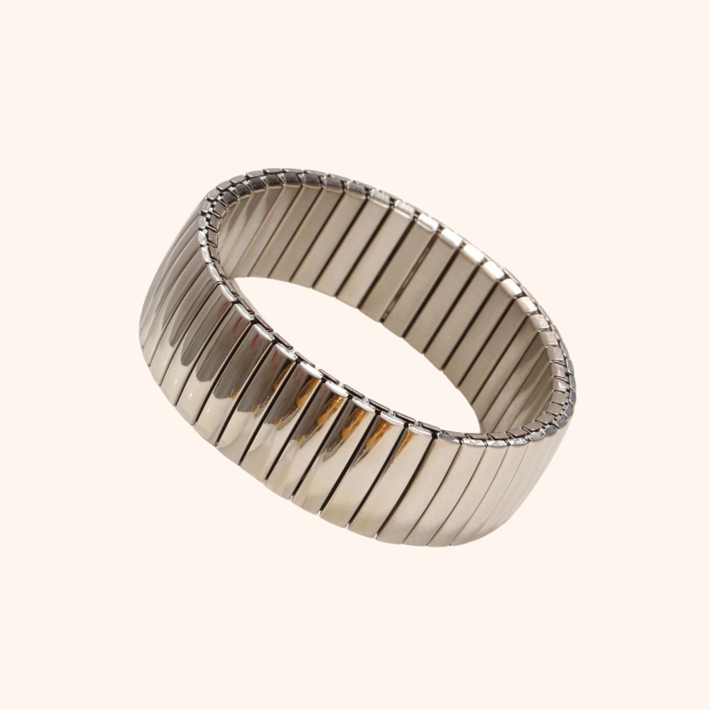 18mm wide 18k gold stretch bracelet with smooth high-shine finish and ribbed texture in polished stainless