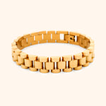 Close-up of the Luxe Watch Band Bracelet in gold, highlighting its luxurious finish and sophisticated style.