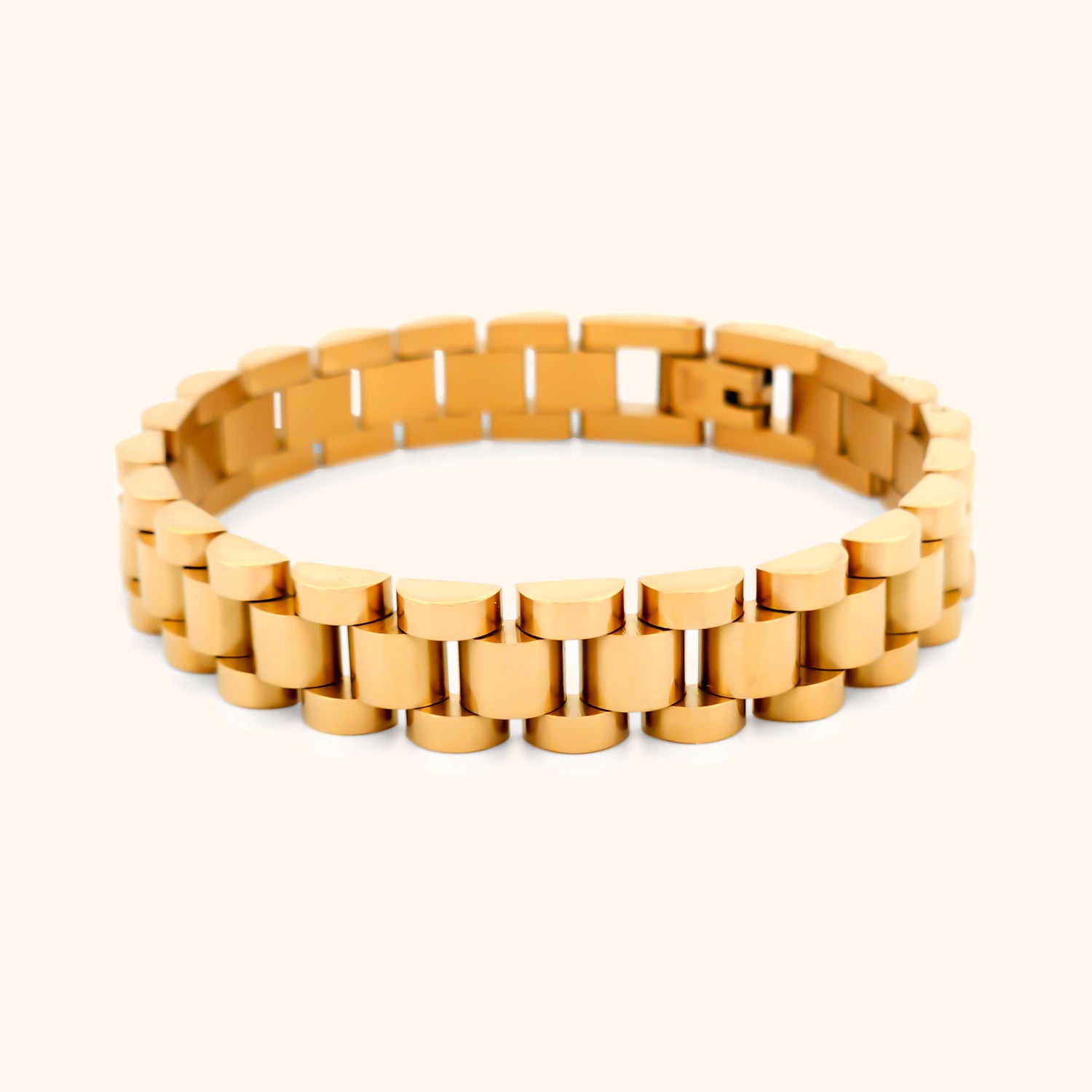 Close-up of the Luxe Watch Band Bracelet in gold, highlighting its luxurious finish and sophisticated style.