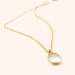 The Cozumel Necklace worn on a model or bust, demonstrating its elegant length and delicate style.