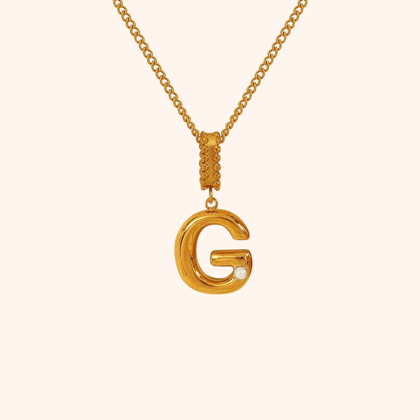 Gold G initial pendant necklace with singular pearl charm