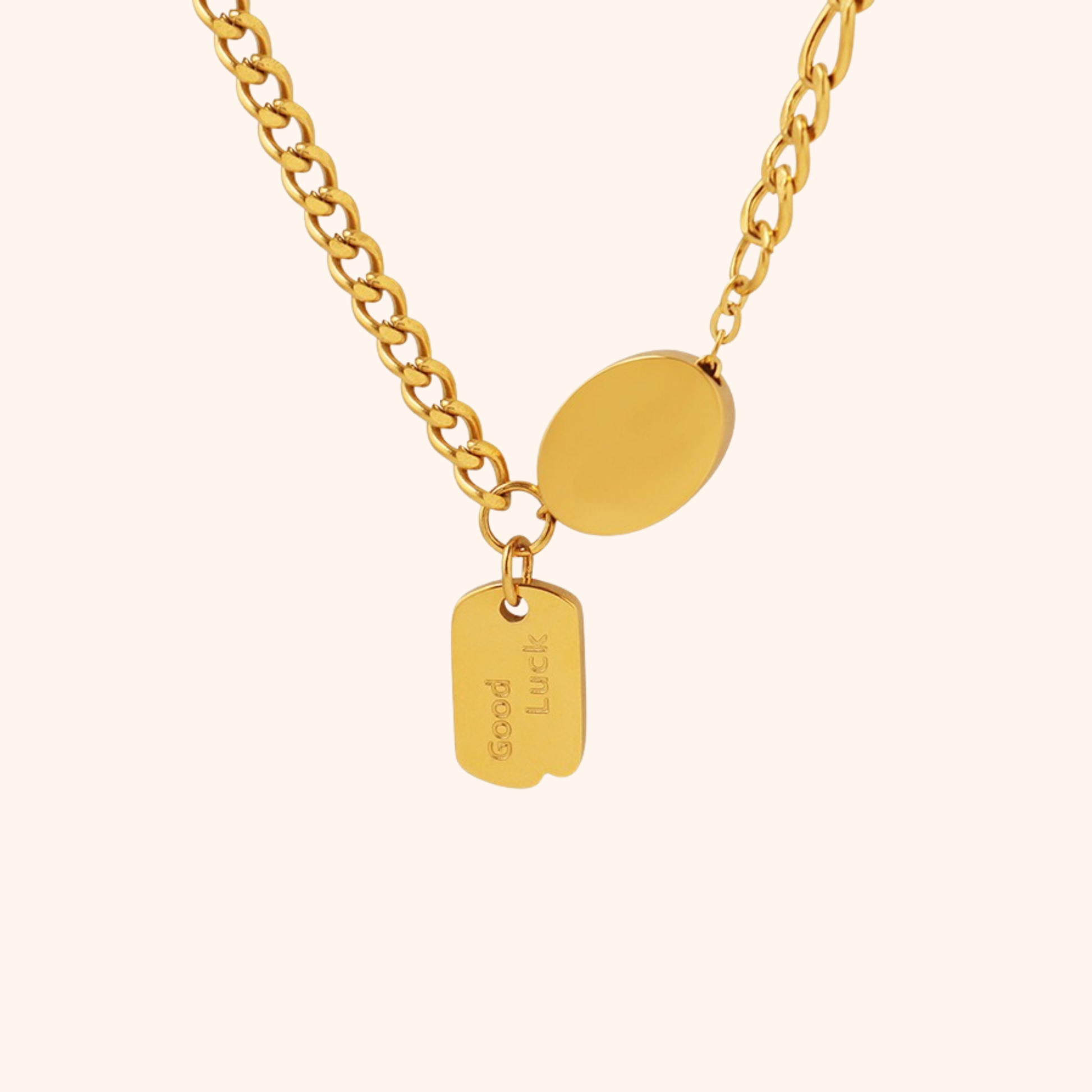 18k gold pendant necklace with engraved “Good Luck” charm on polished chain