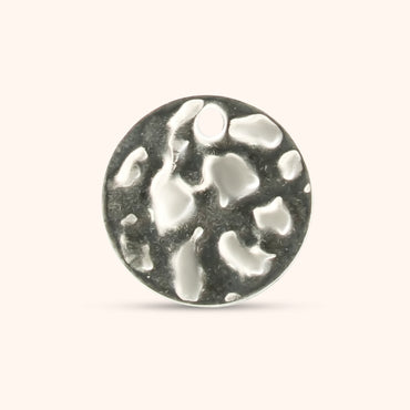 Round hammered silver charm with a small top hole, made of polished stainless steel