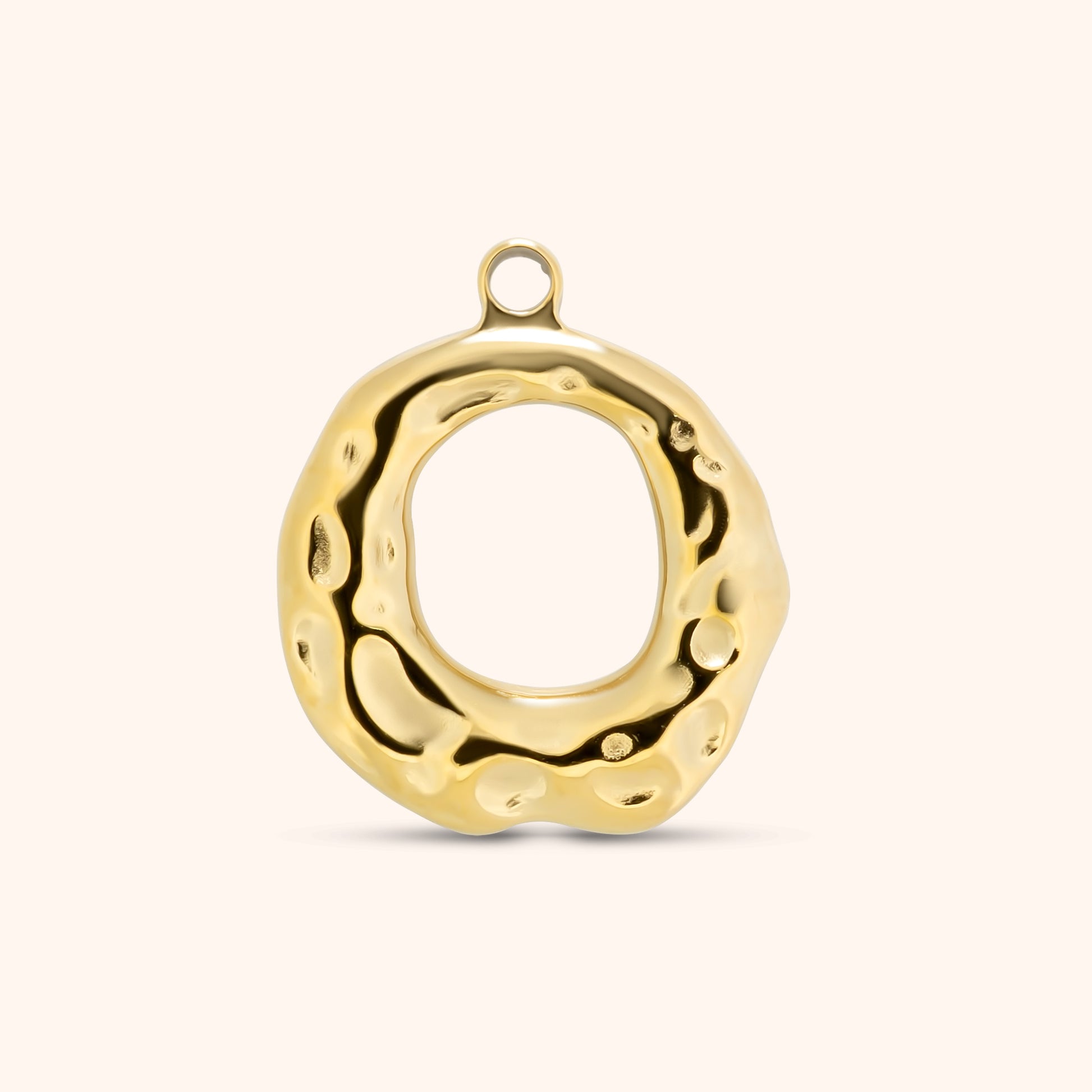 Abstract open circle gold charm with molten, irregular texture and a top loop, made of polished 18k gold plated stainless steel