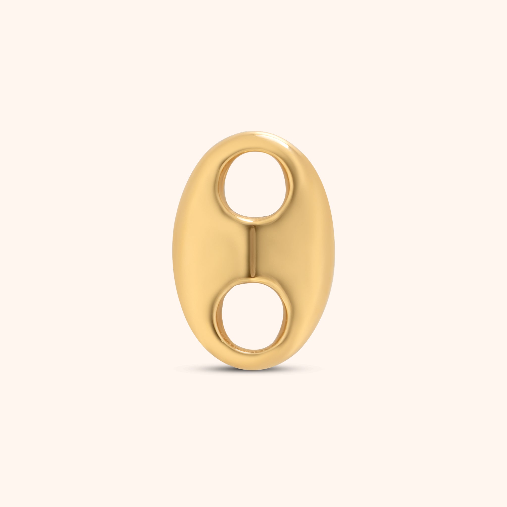 Smooth oval gold spacer charm with dual openings, made of 18k gold plated stainless steel and designed for connecting jewelry pieces