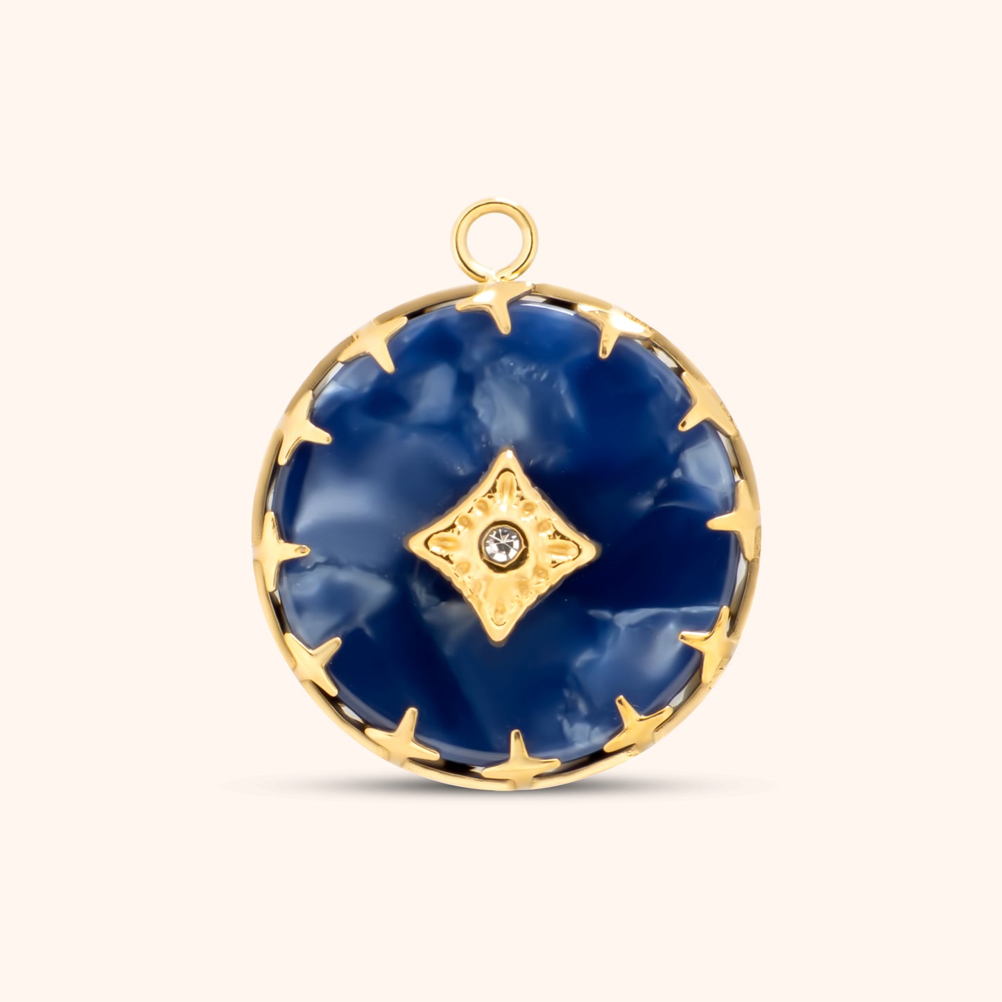 Round blue resin charm with gold starburst setting and center crystal, framed in gold with a top loop for attaching to necklaces or bracelets