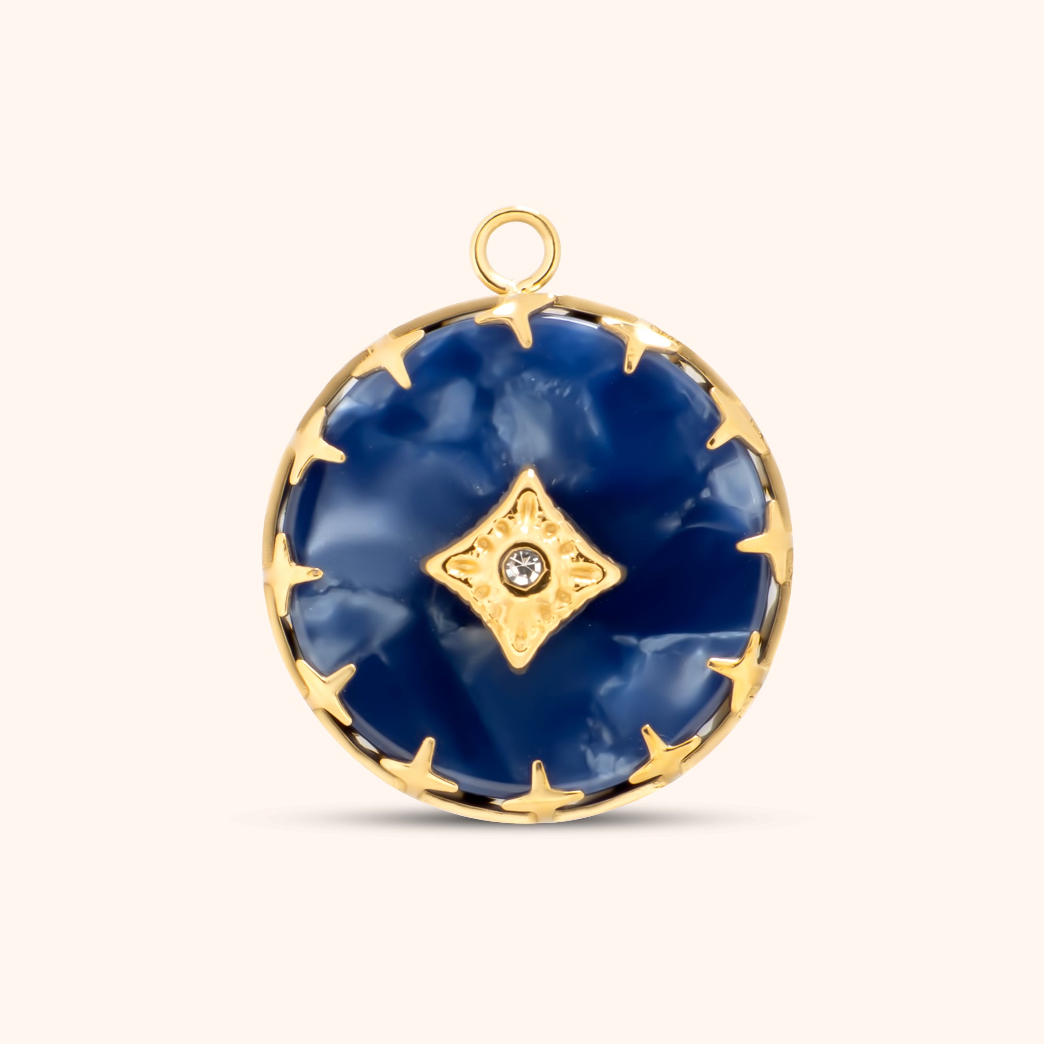 Round blue resin charm with gold starburst setting and center crystal, framed in gold with a top loop for attaching to necklaces or bracelets