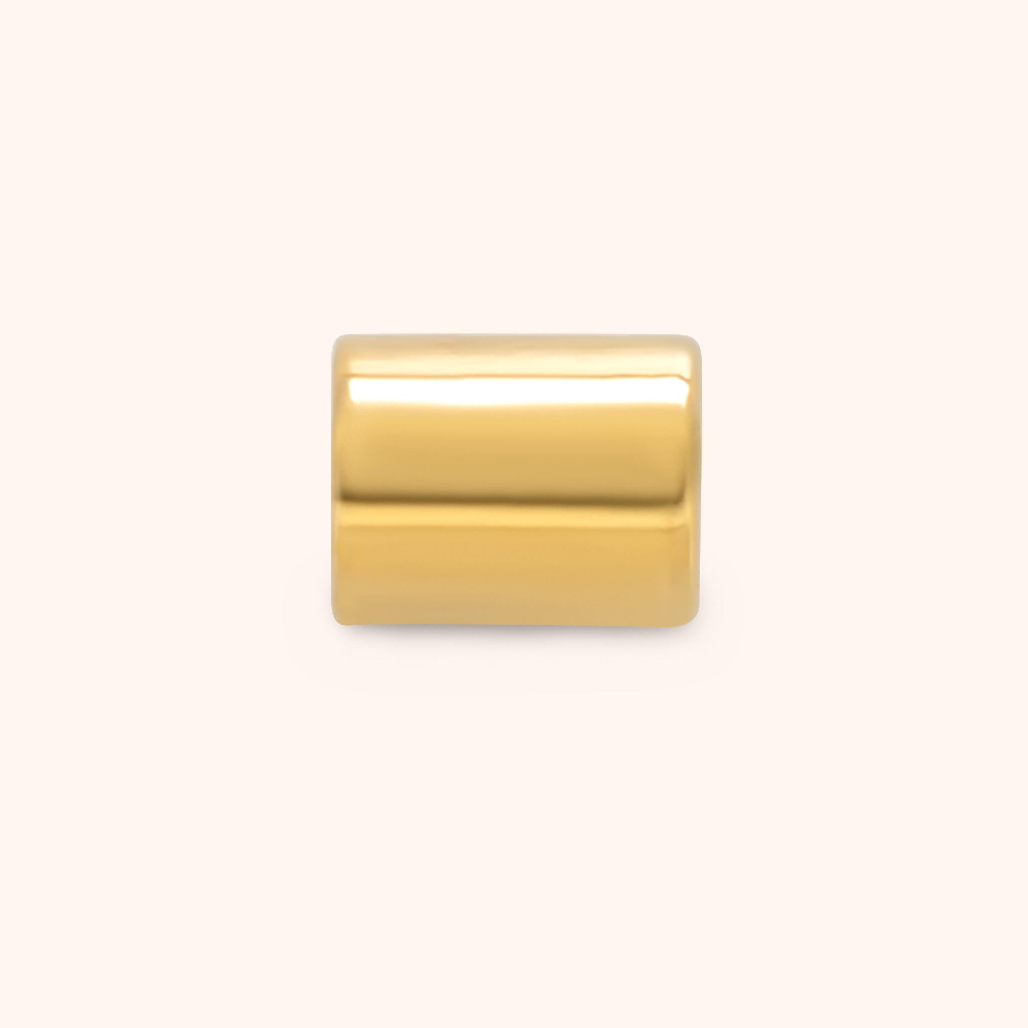 PRESSIE Gleam Spacer Bead; a single, smooth, polished 18k gold plated cylindrical tube bead for charm necklaces.