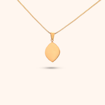 Rear view of the Navigator Pendant, showcasing the gold chain and the intricate design of the geometric pendant.