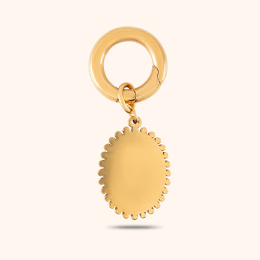 Rear view showing textured border and smooth golden finish