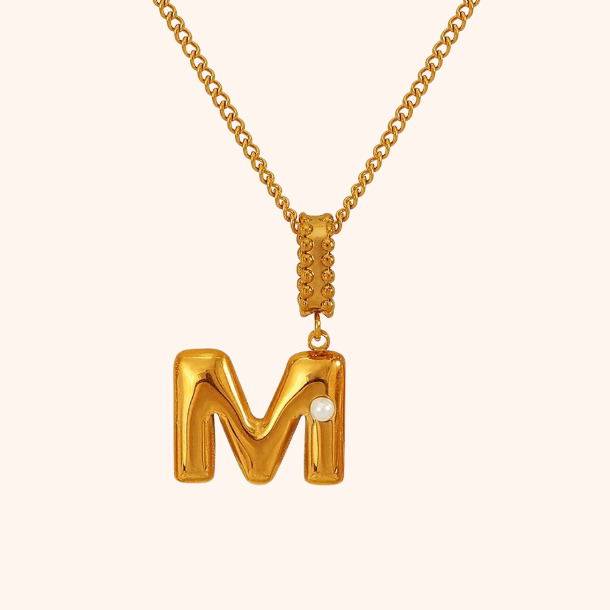 Gold letter M necklace with pearl charm on chain
