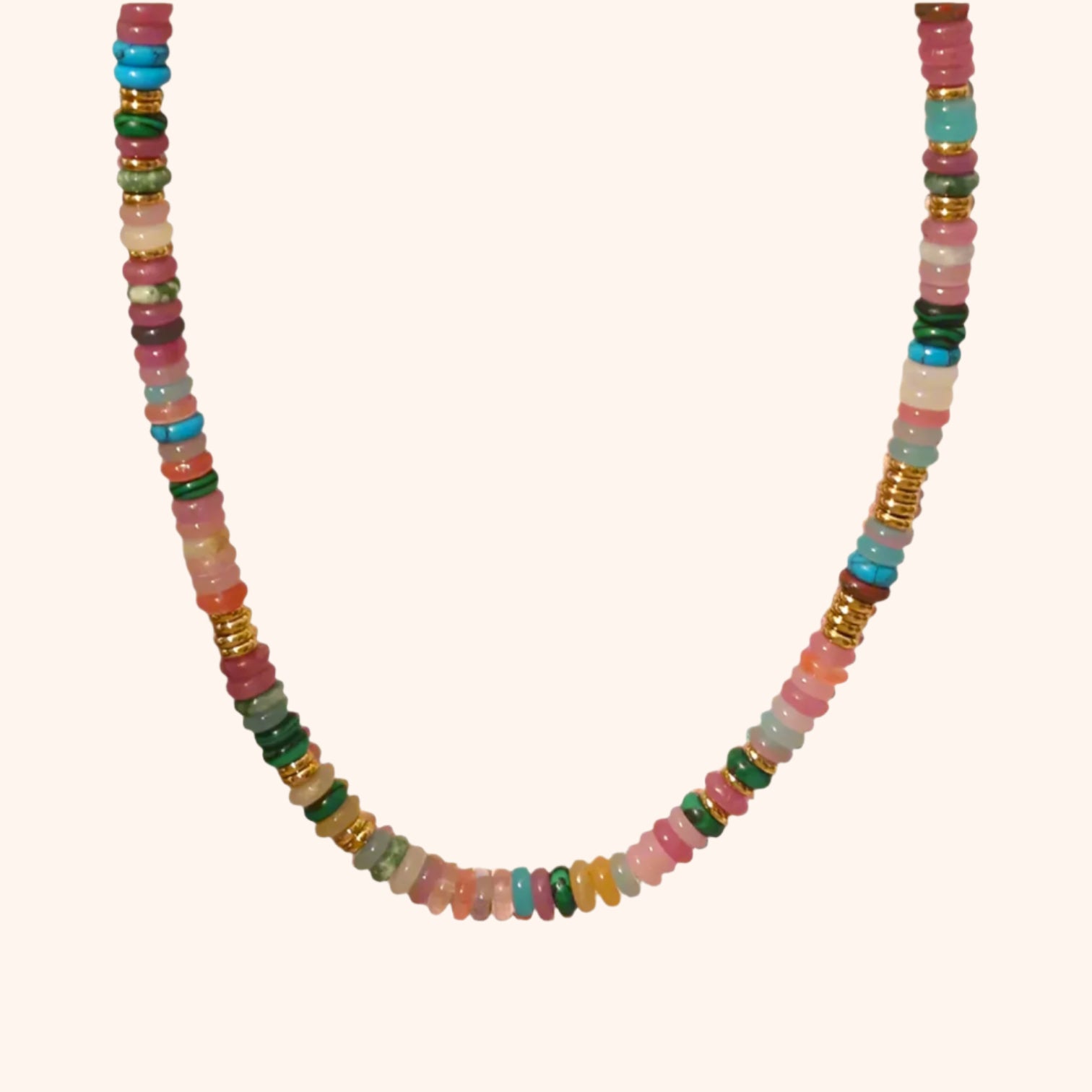 Rainbow beaded necklace featuring colorful beads and 18k gold-plated spacers, showcasing its vibrant and joyful design.
